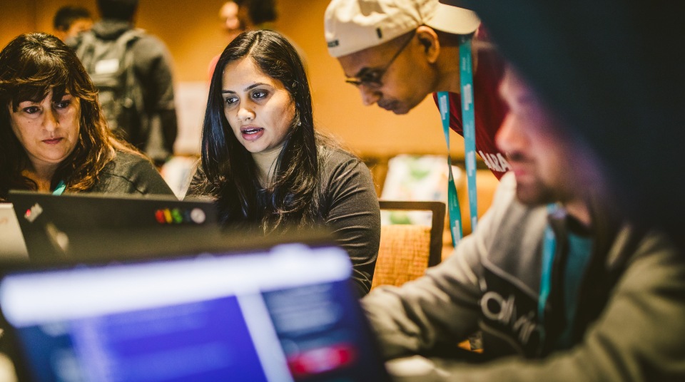 People working on their computers with the world’s leading analytics platform Tableau